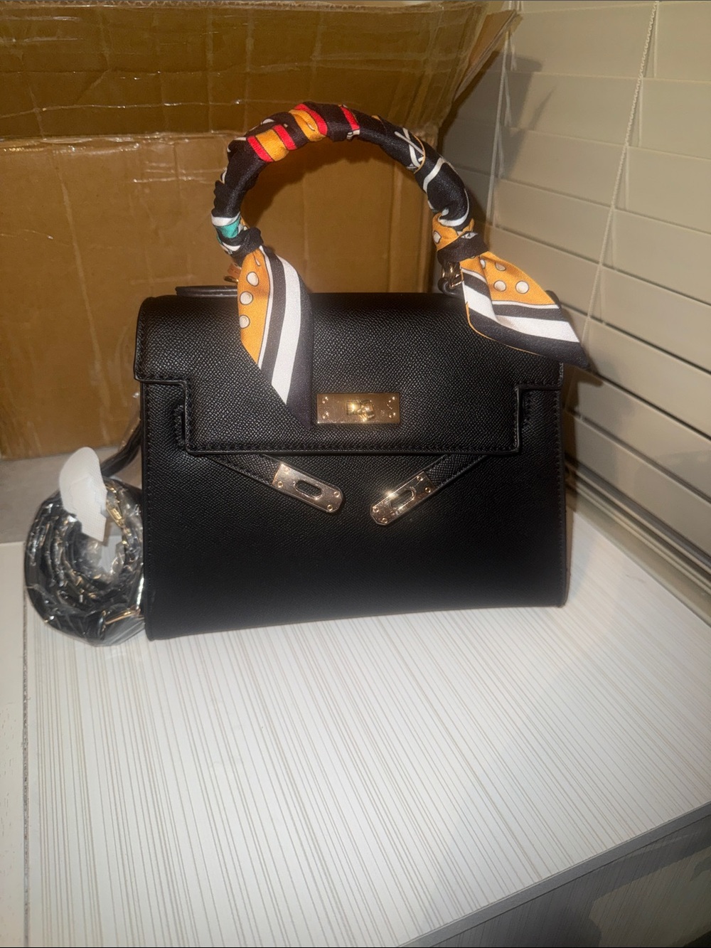 Structured Black Top-Handle Satchel with Scarf-Wrapped Handle